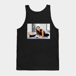 Young woman reading a yoga book Tank Top